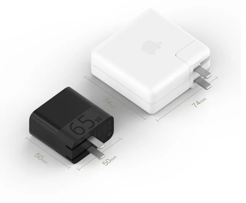 Black ZMI USB-C 65W compact laptop power adapter showing size comparison