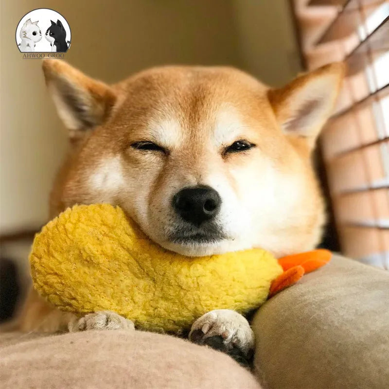 Yellow plush fried shrimp tempura squeaky dog toy with built-in squeaker