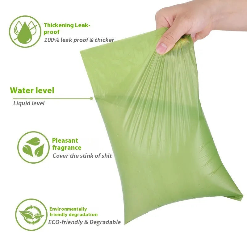 Green roll of EPI degradable thickened pet poop bags next to a green dispenser unit on a white background.