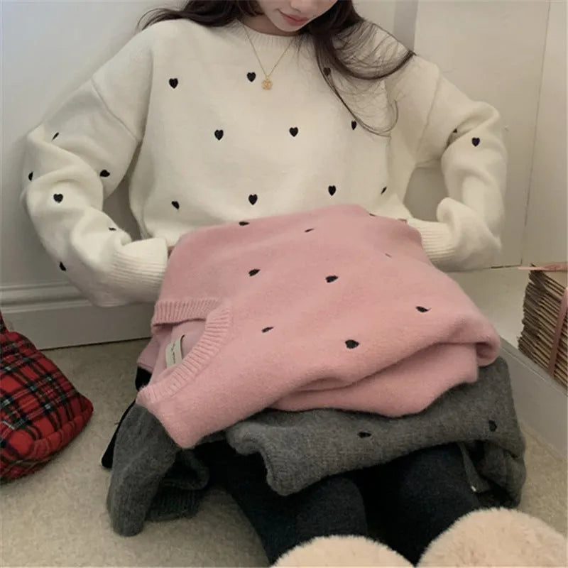 Women's loose acrylic pullover sweater with embroidery details in milky white colour