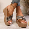 Casual brown and black plaid wedge sandals with cross-leopard pattern and rubber sole.