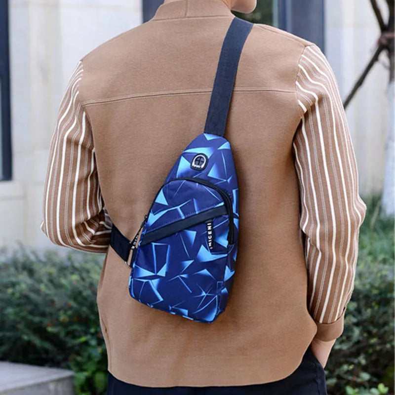 Print sling chest bag with earphone hole design in Oxford cloth, showing zipper opening and square vertical shape