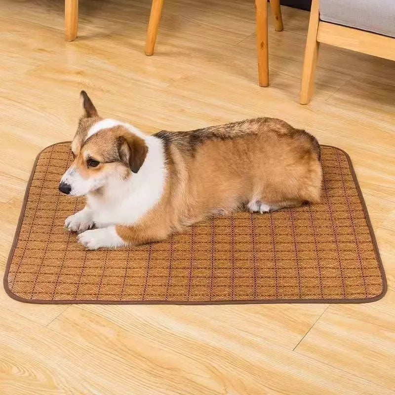 Brown woven rattan cooling mat for dogs, shown in a large size on a wooden floor.