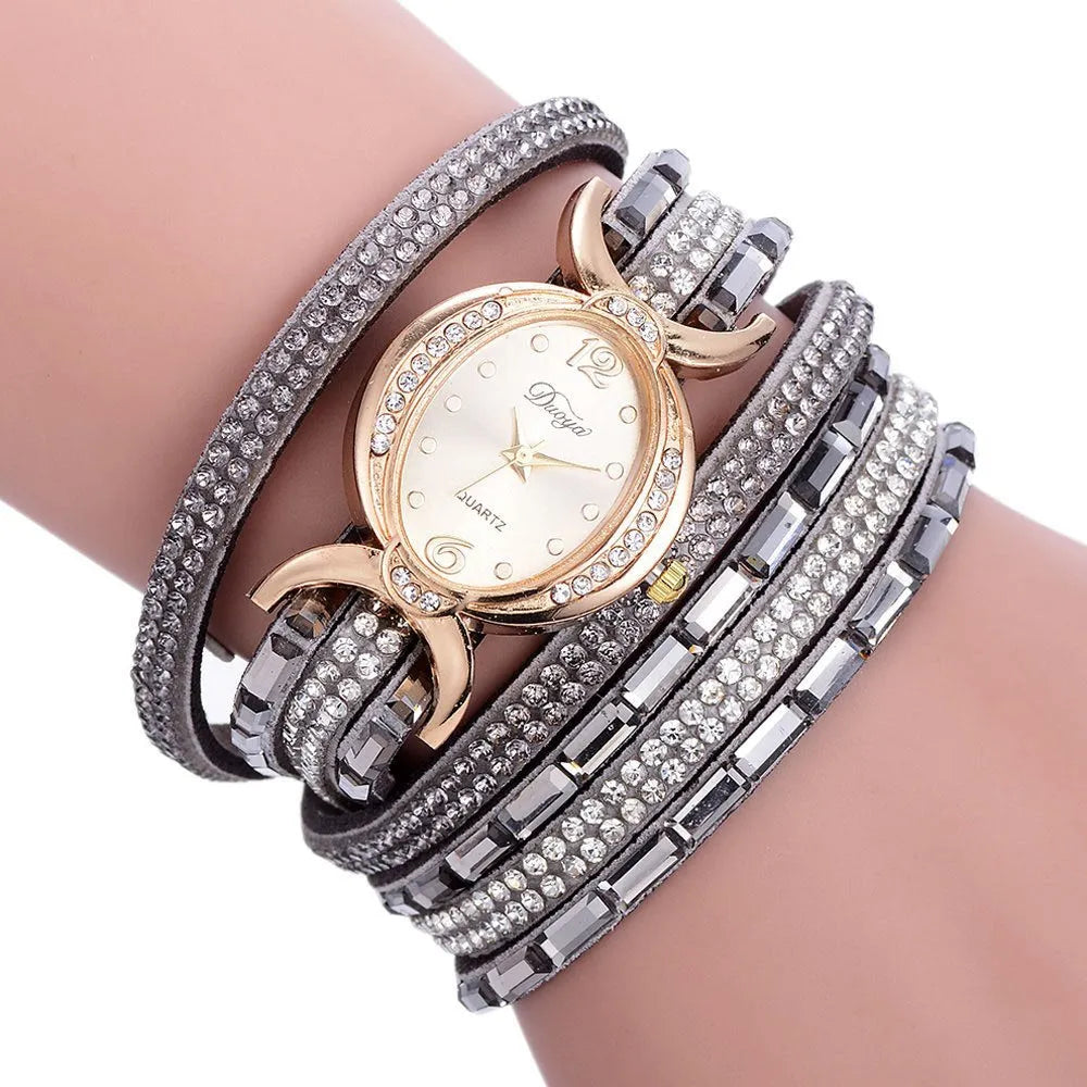 New casual rhinestone watch for women with round stainless steel case, leather band, and analog quartz movement
