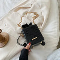 Korean-style small black PU bucket bag with a silver chain strap, shown open.