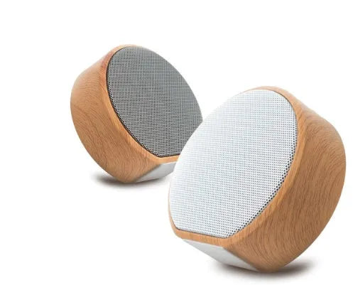 Mini wood Bluetooth speaker in white with bass diaphragm and Micro USB port