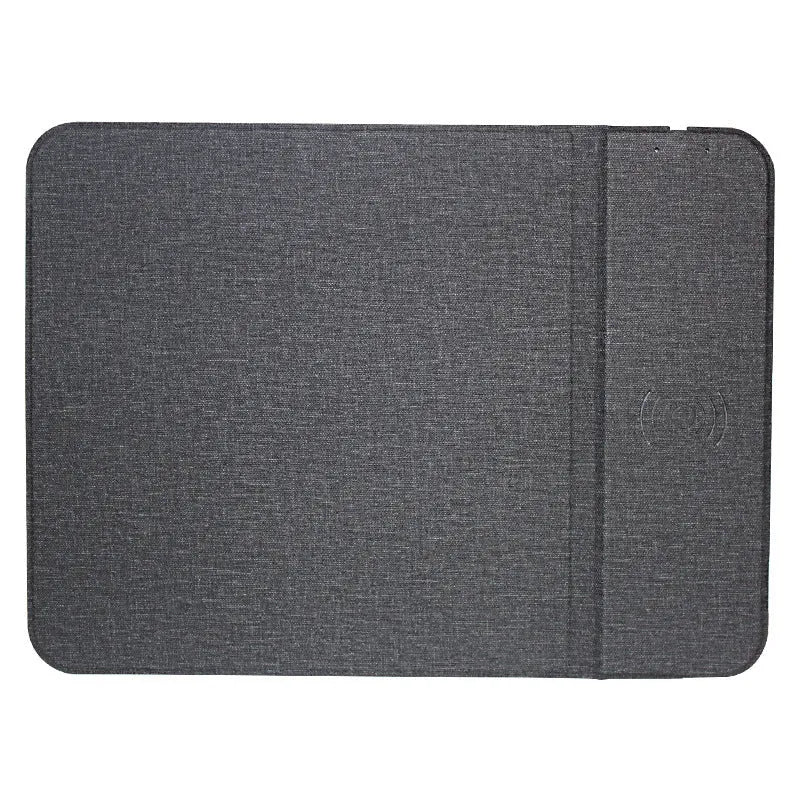 Black foldable cloth phone holder open and showing wireless charging pad.