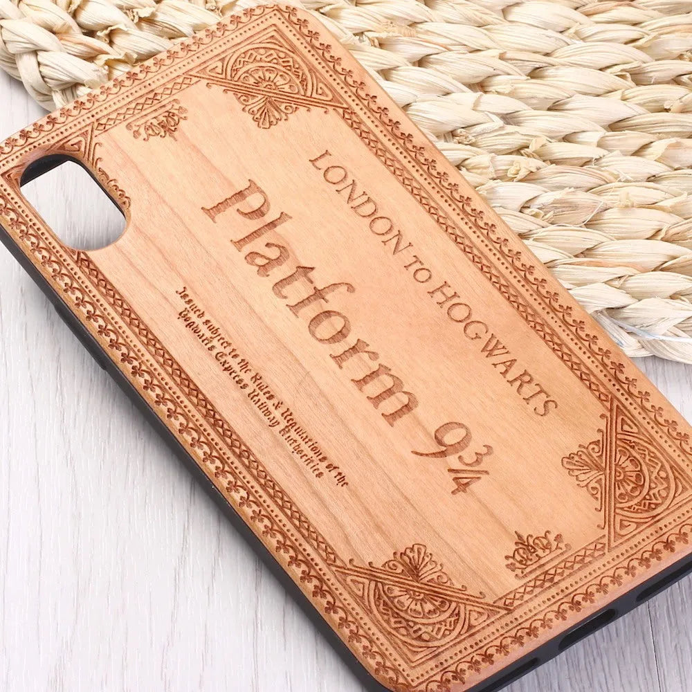 Laser-carved wooden back cover iPhone case with TPU frame showing detailed pattern.