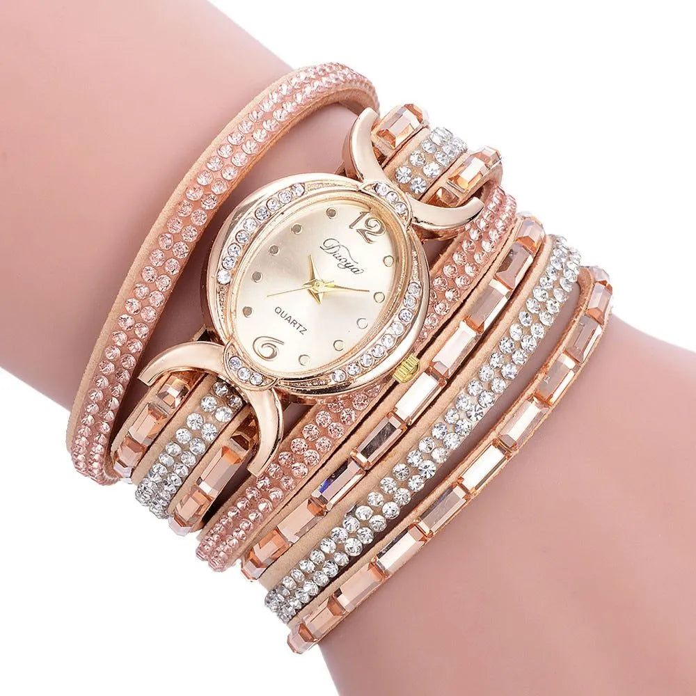 New casual rhinestone watch for women with round stainless steel case, leather band, and analog quartz movement