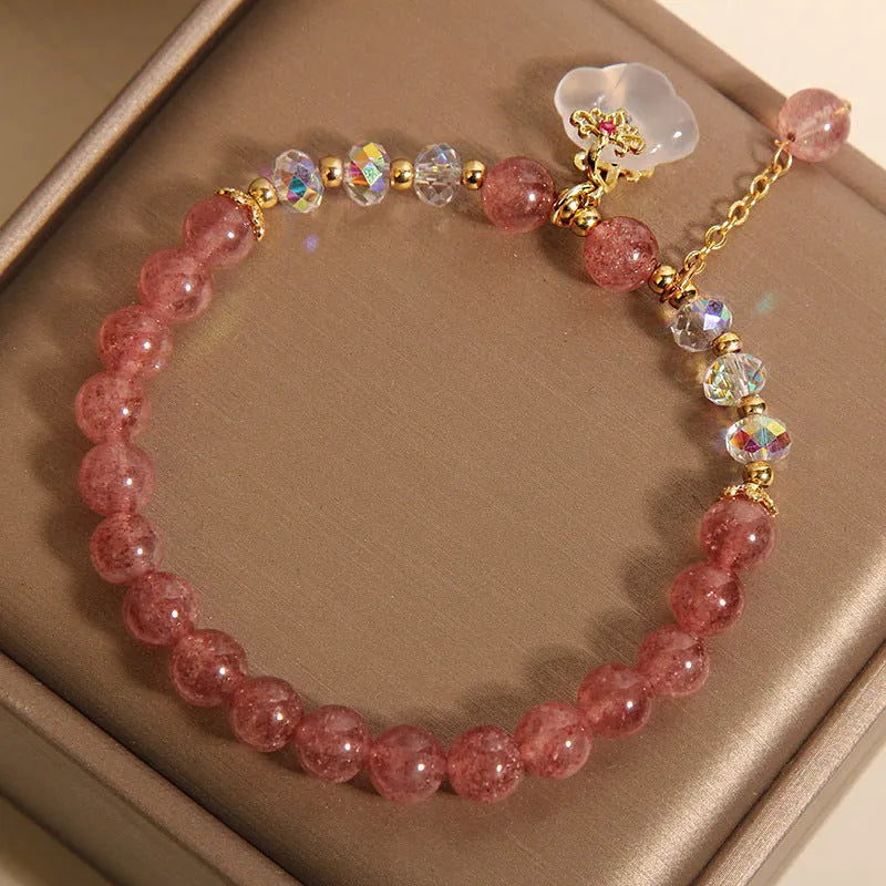 Women's strawberry quartz and white agate crystal bracelet with auspicious cloud design