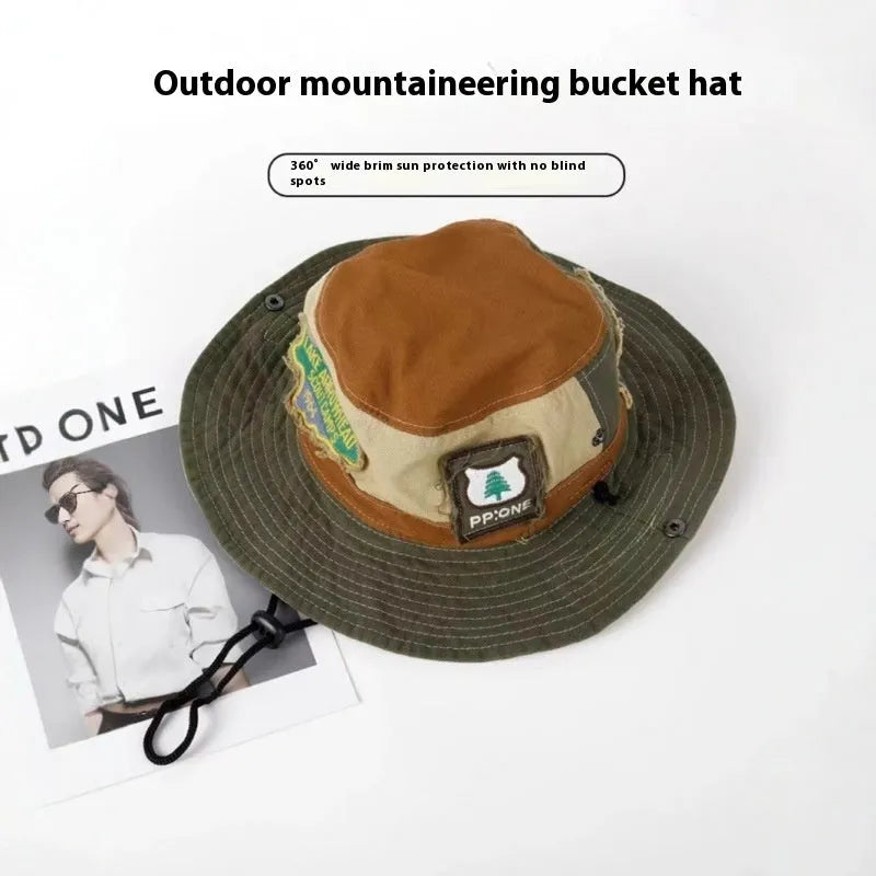 Army green cotton fisherman hat with retro patchwork design and flat top crown for summer sun protection