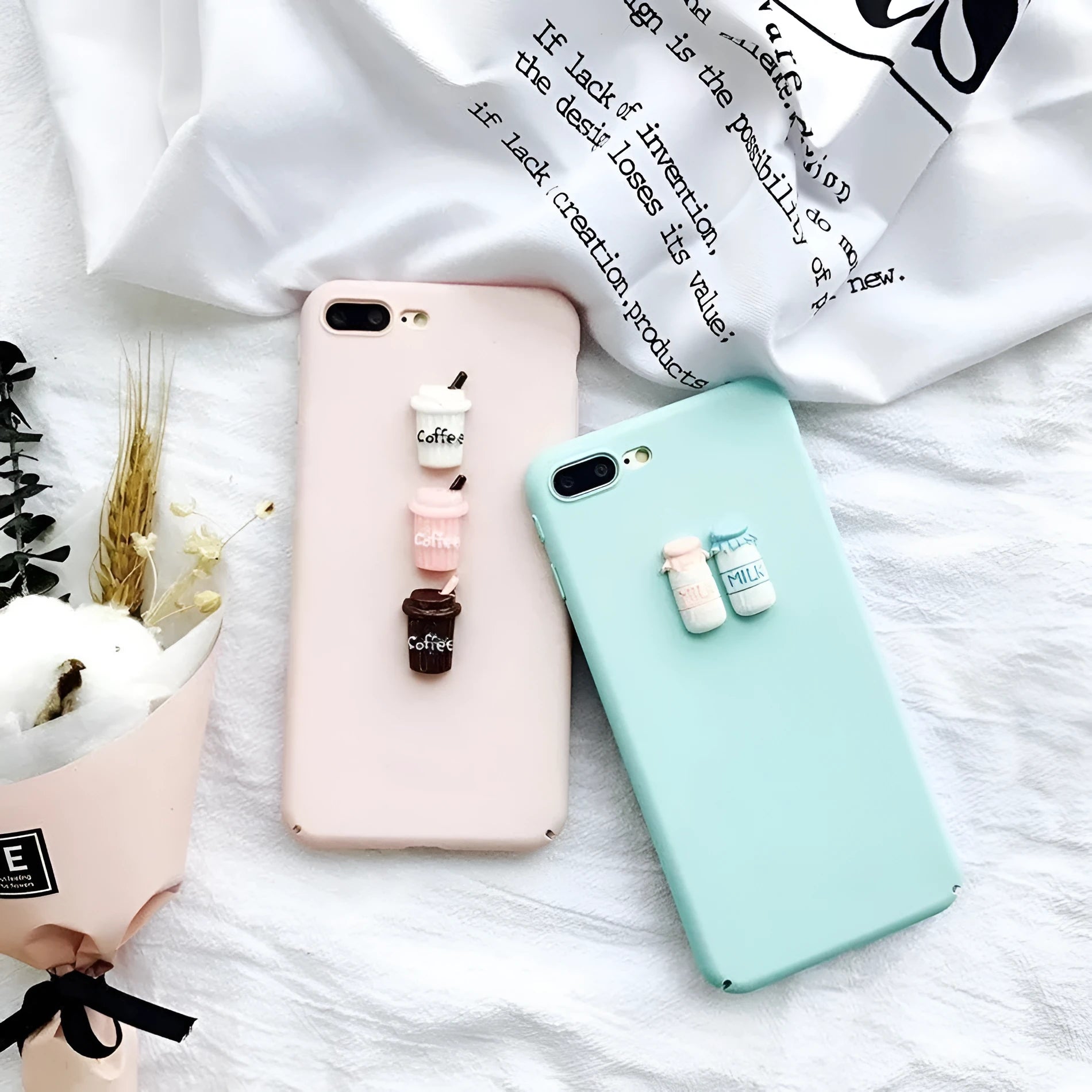 Soft pink silicone iPhone case with a 3D cartoon cat design on the back.