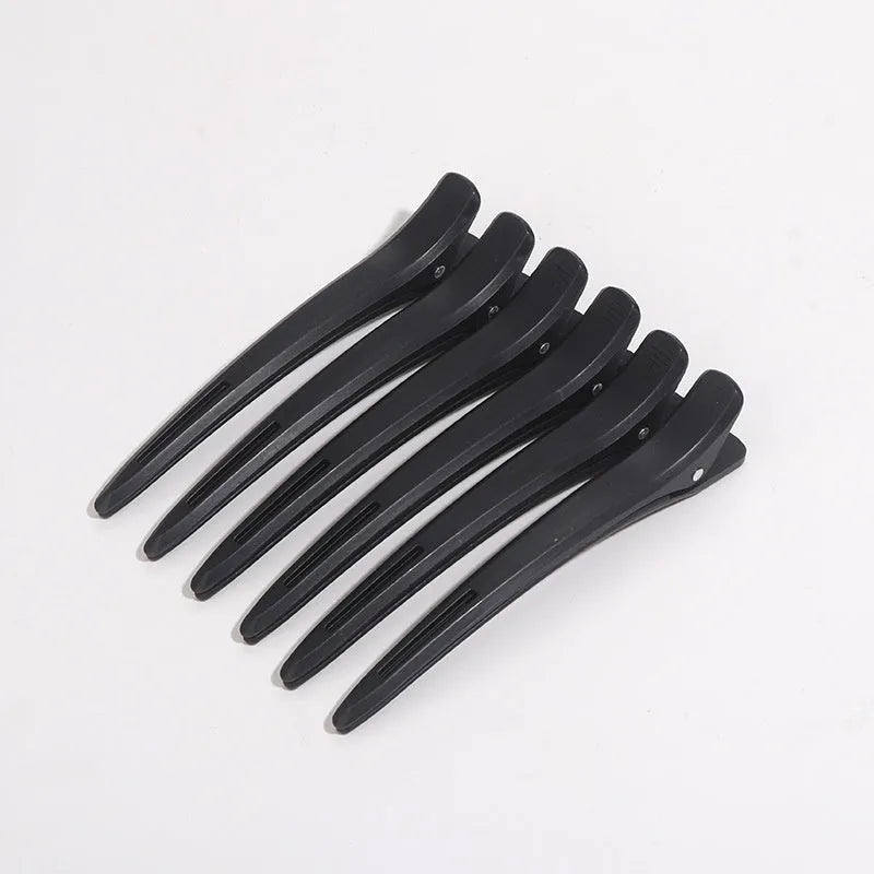 Electric hair styling comb with heat conductor, insulation spray bottle, and plastic sectioning clips