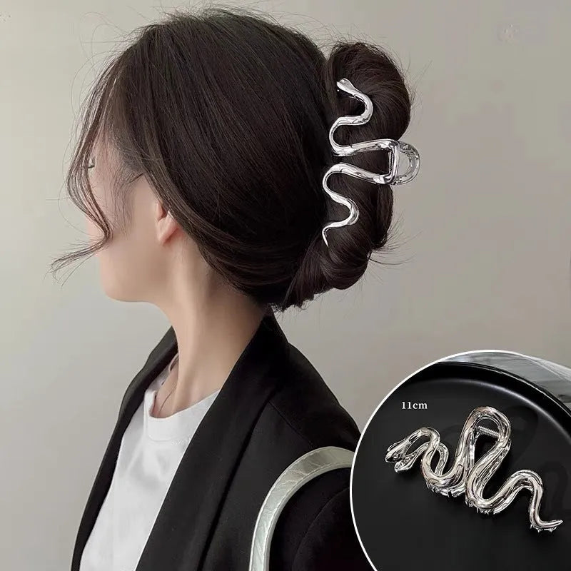 Silver Slytherin serpentine snake design metal hair barrette measuring 10.5cm.