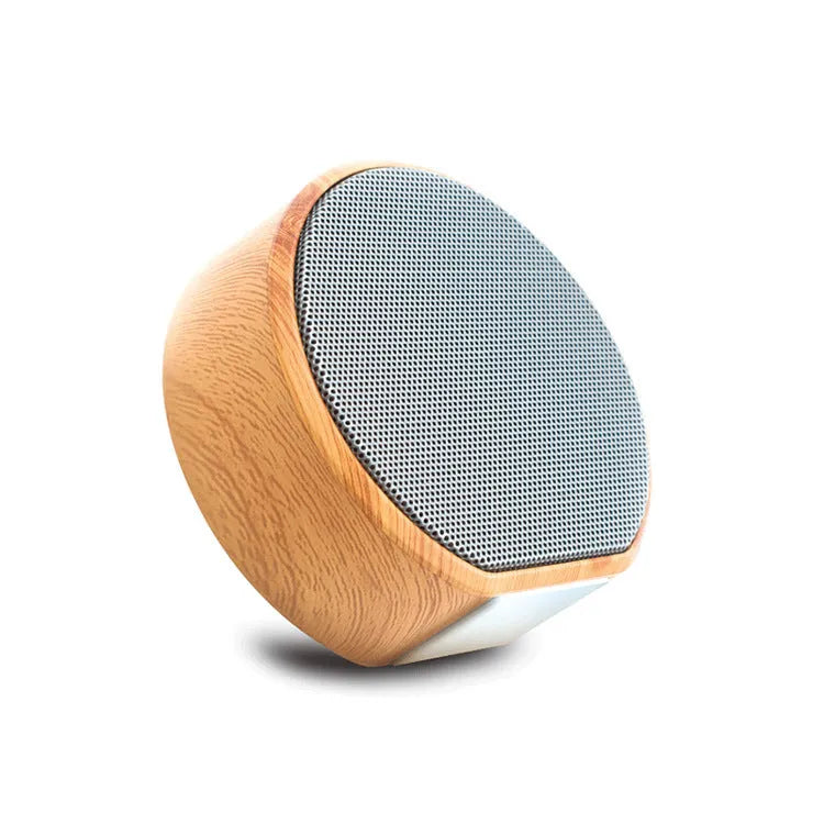 Mini wood Bluetooth speaker in white with bass diaphragm and Micro USB port