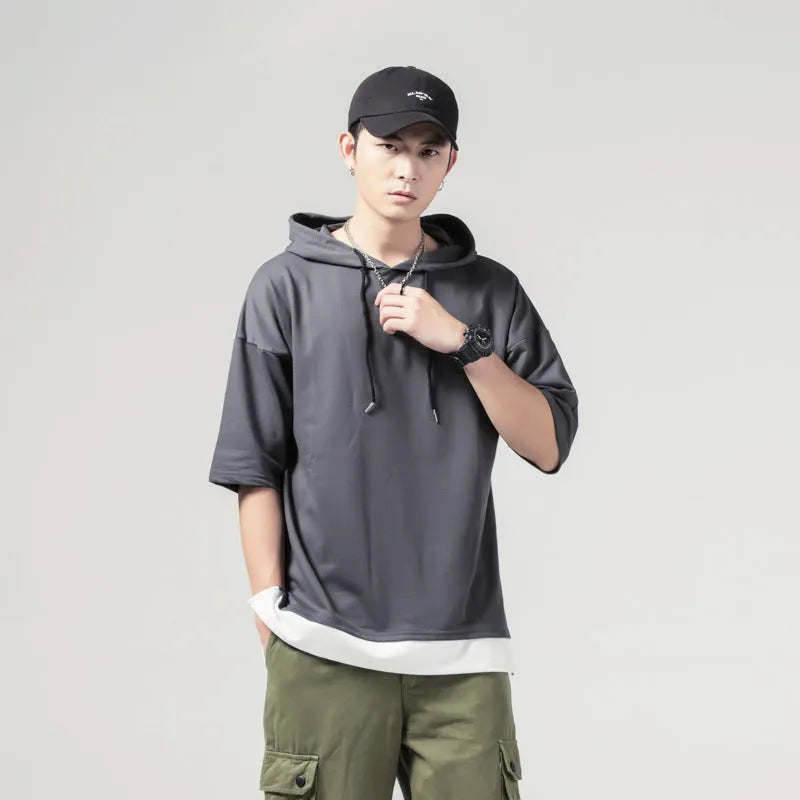 Solid colour loose fit hooded men's short-sleeved T-shirt in black with 3/4 sleeves