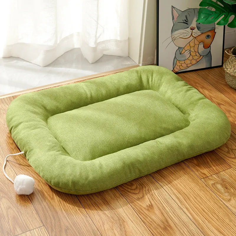 Brown and green pet cushion with removable cover shown in four sizes for small to medium dogs and cats