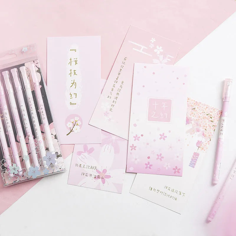 Six black Creative Sakura gel pens with pull-out mechanisms and 0.5mm needle tips.