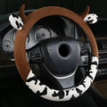 Plush car steering wheel cover with protective handle in black or coffee brown colours
