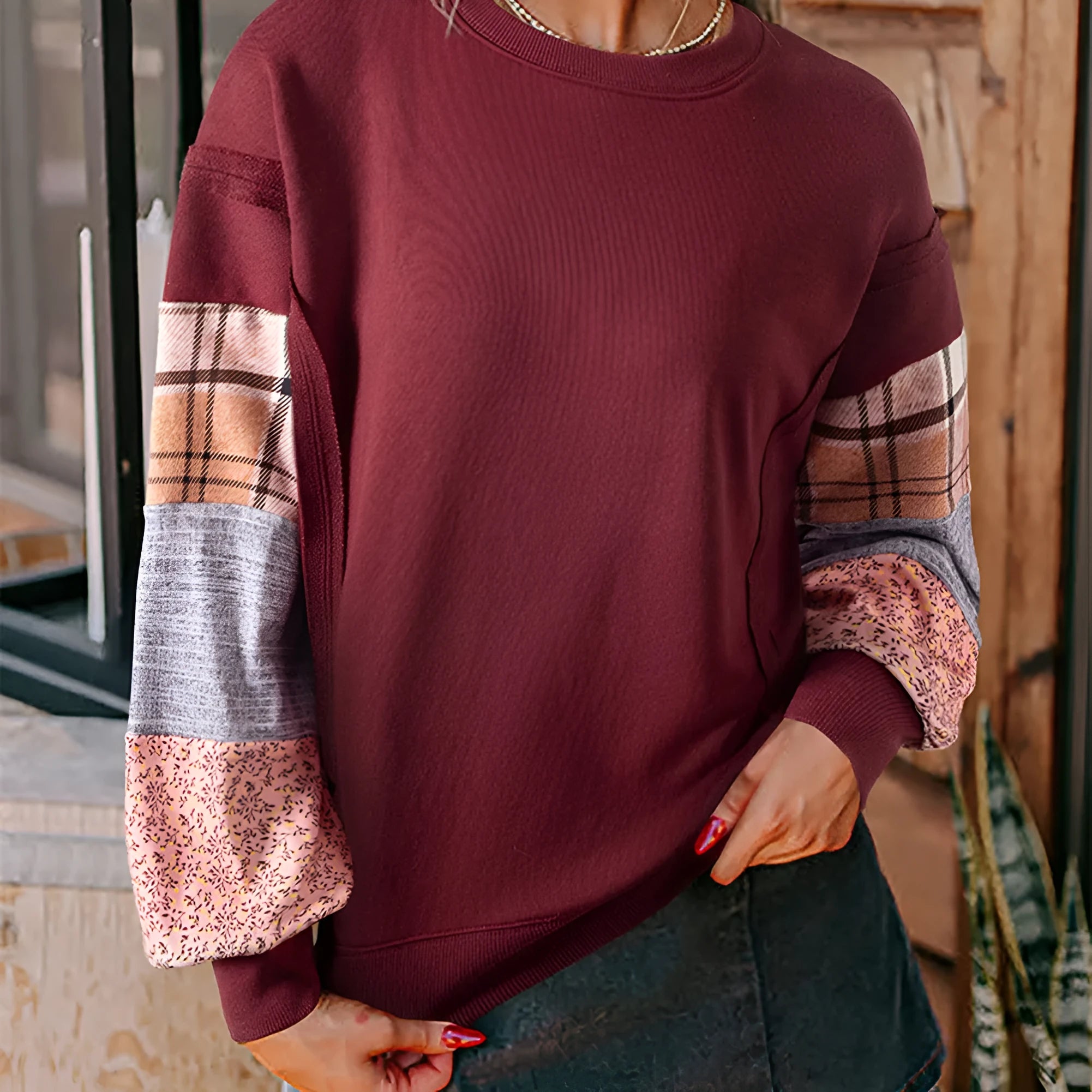 Women's plaid patterned long-sleeved casual top in apricot colour with striped design elements