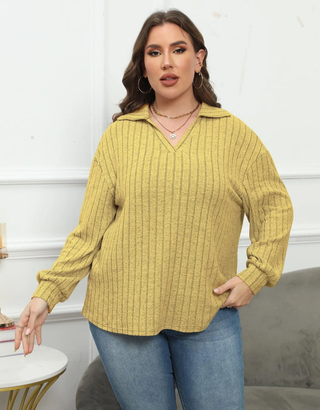 Women's plus size melange gray fleece pullover with blouse collar and lantern sleeves, side view