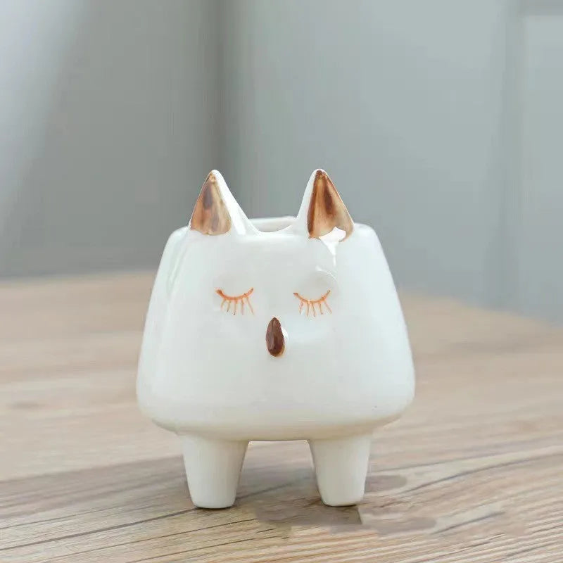 Ceramic succulent flowerpot with hand painted cartoon animal design in colourful pattern
