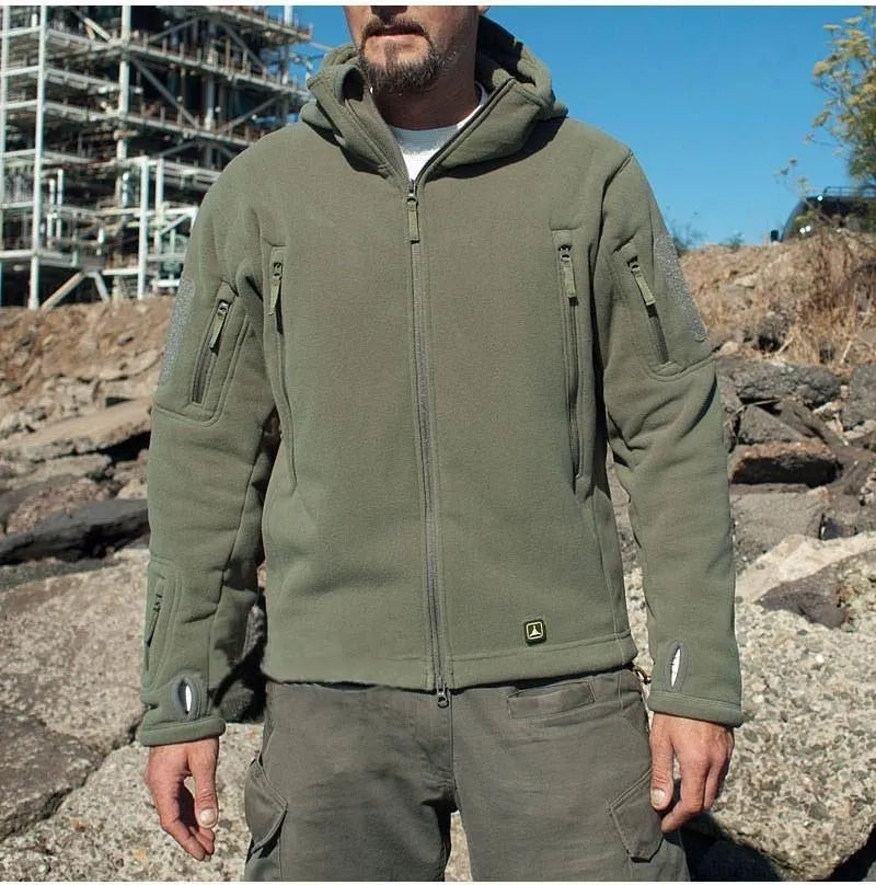 Men's military winter thermal fleece tactical jacket in khaki with multiple pockets on a model