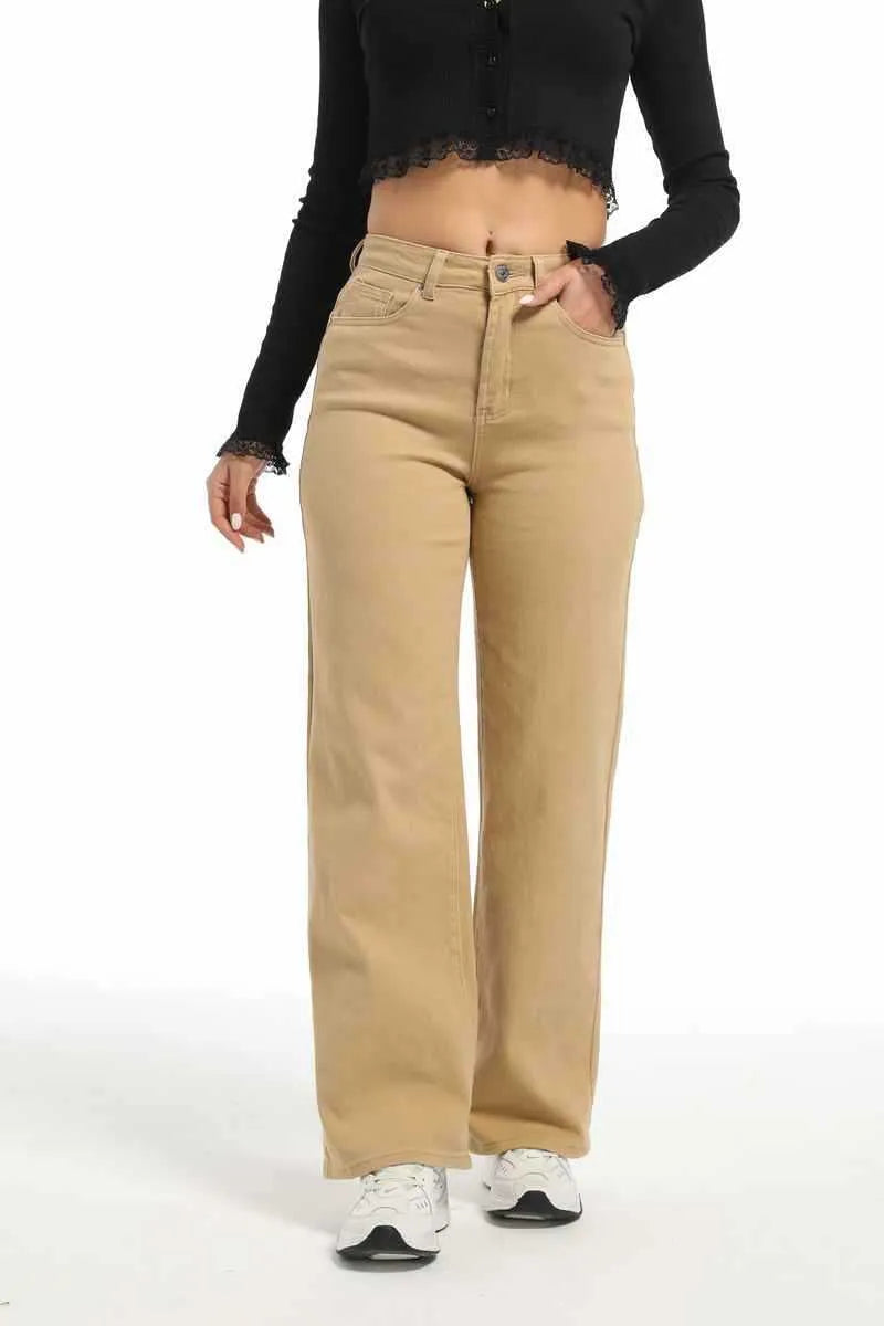 Women's high-waist straight leg cotton trousers in apricot colour, showing wide-leg silhouette.