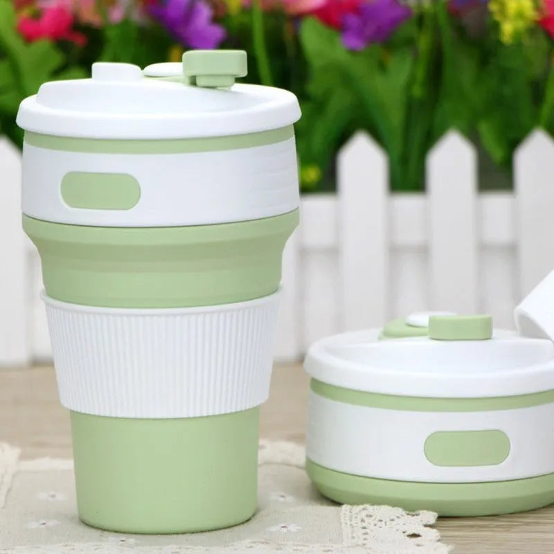 Green collapsible silicone travel mug shown expanded and folded to 6cm height