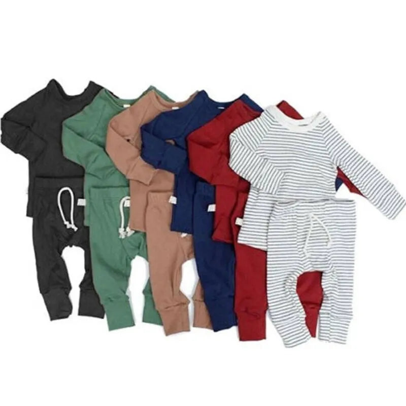 Blue cotton baby romper tracksuit set with cartoon pattern, showing top and pants.