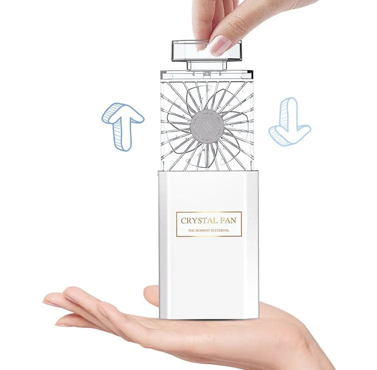 Pink portable perfume fan with rechargeable battery and fragrance misting function