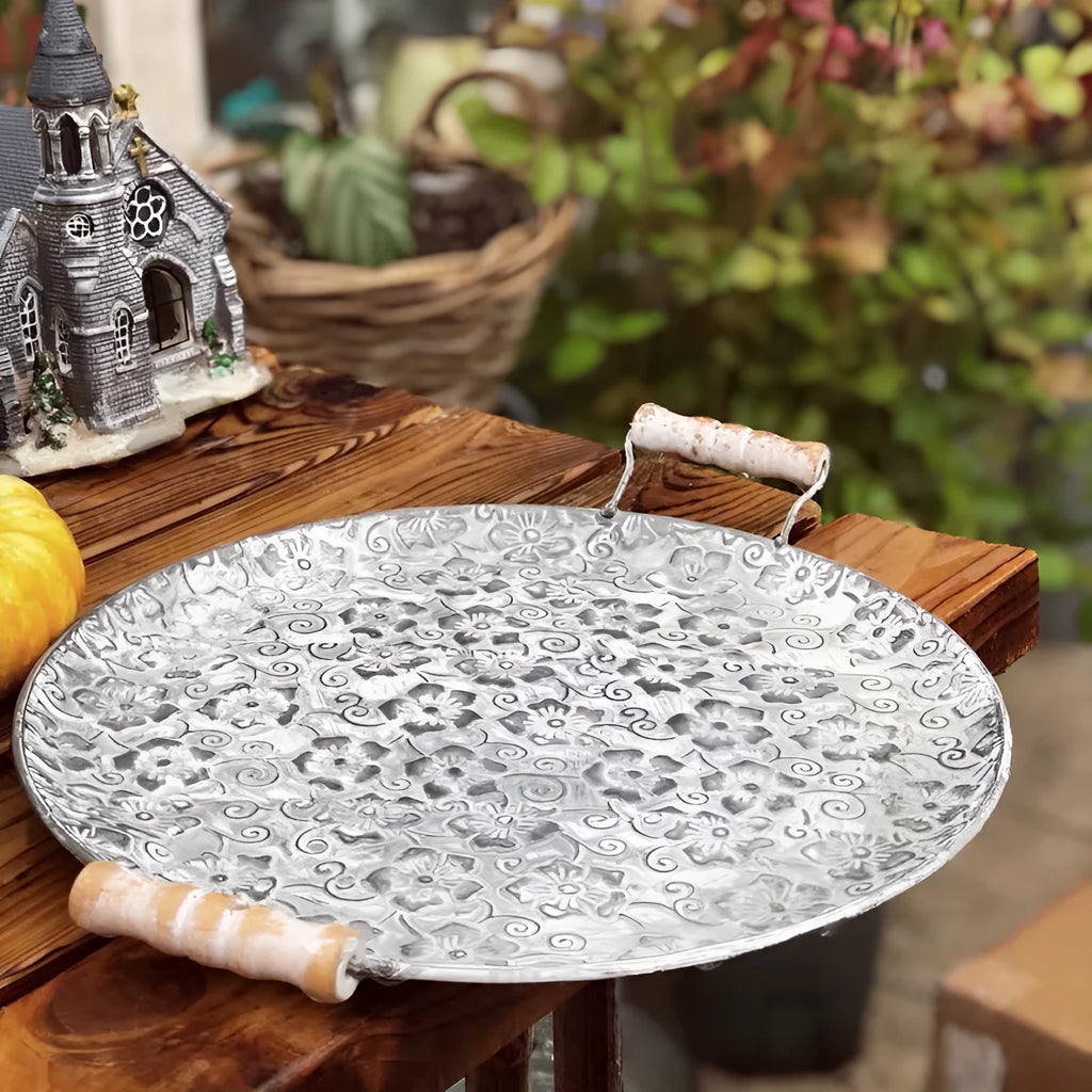 Round wrought iron storage tray in European style, shown in two size options.