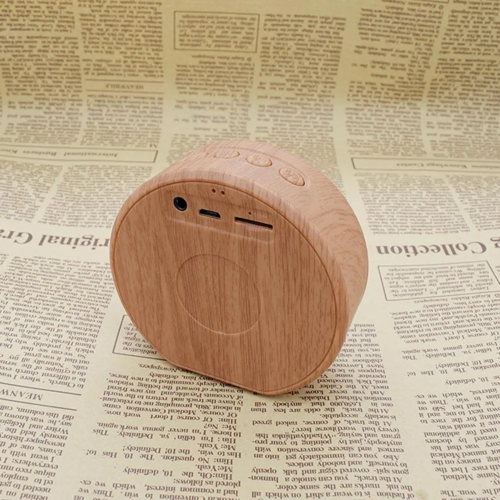 Mini wood Bluetooth speaker in white with bass diaphragm and Micro USB port