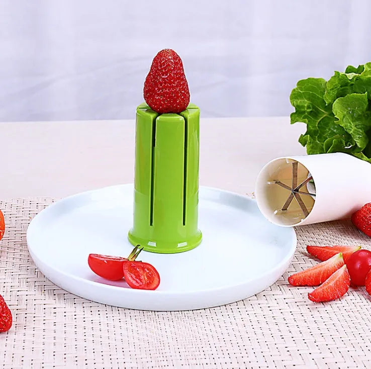 White vegetable cutter with six stainless steel blades for slicing cucumbers, carrots and strawberries