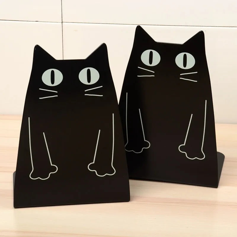 Pair of iron bookends in blue colour, 14 x 20.5 x 10.5cm, holding books upright on a shelf