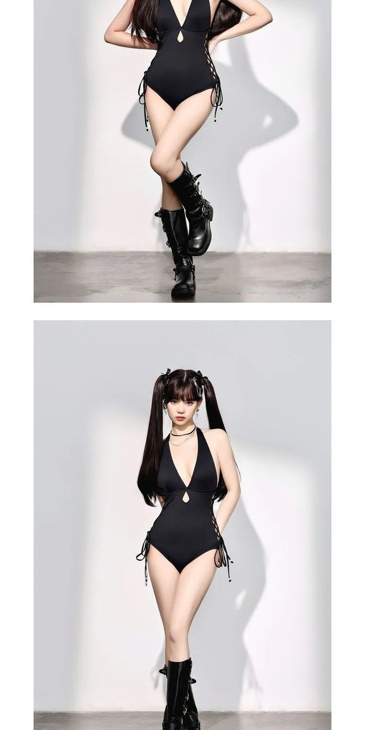 Black women's one-piece swimsuit with V-neckline and hollow strap design on mannequin
