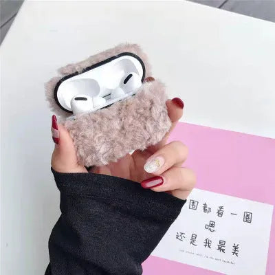 Green plush plastic headphone cover for Apple AirPods showing creative design elements