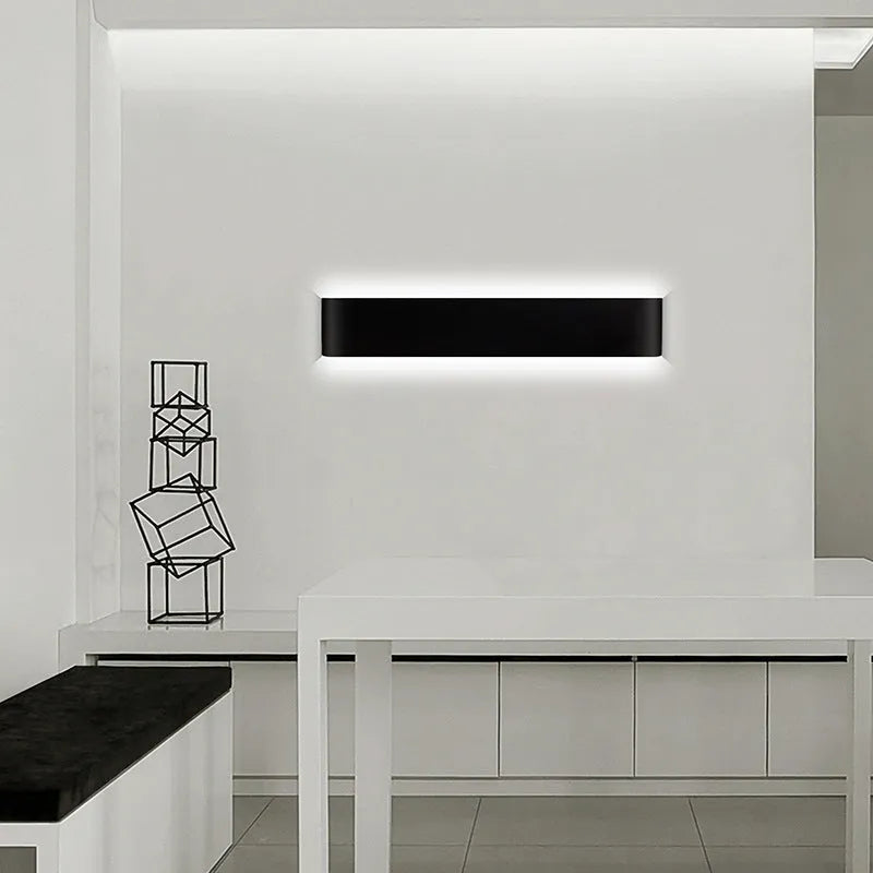 Modern minimalist 12W aluminium alloy wall light with 3000K warm light in black finish for indoor hallway installation