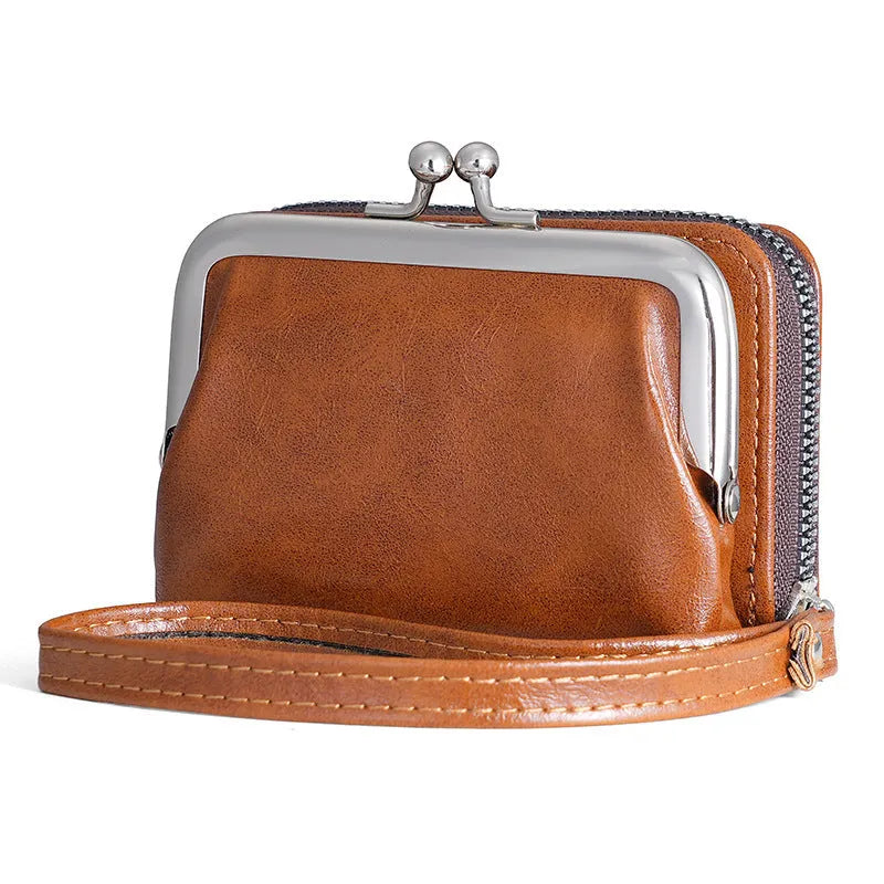 Ladies' leather-look coin purse with a 4-inch metal clip and zip closure in five colour options.