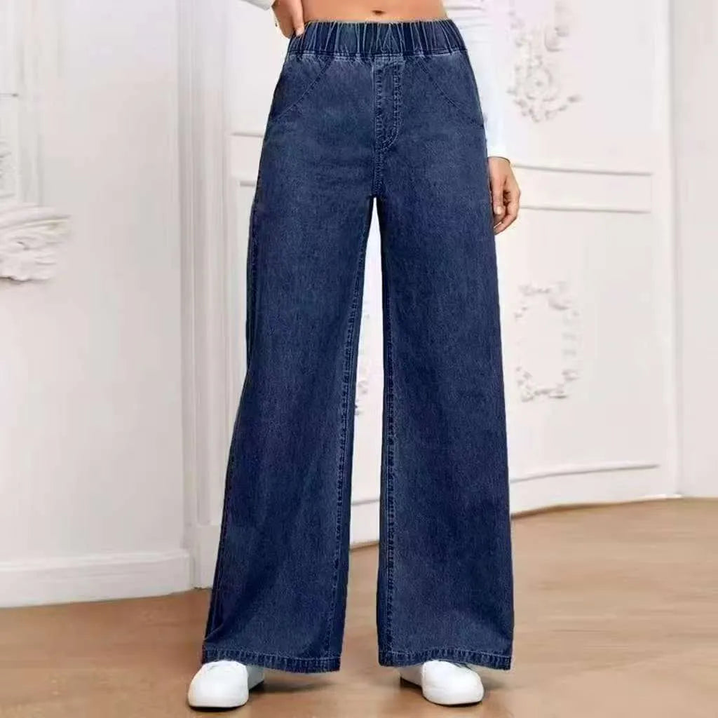Light blue washed denim trousers with wide leg straight cut in plus sizes