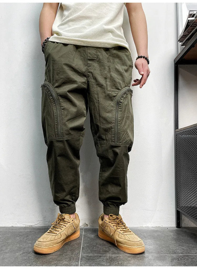 Men's loose fit cotton cargo trousers with elastic waist and zipper pockets in army green