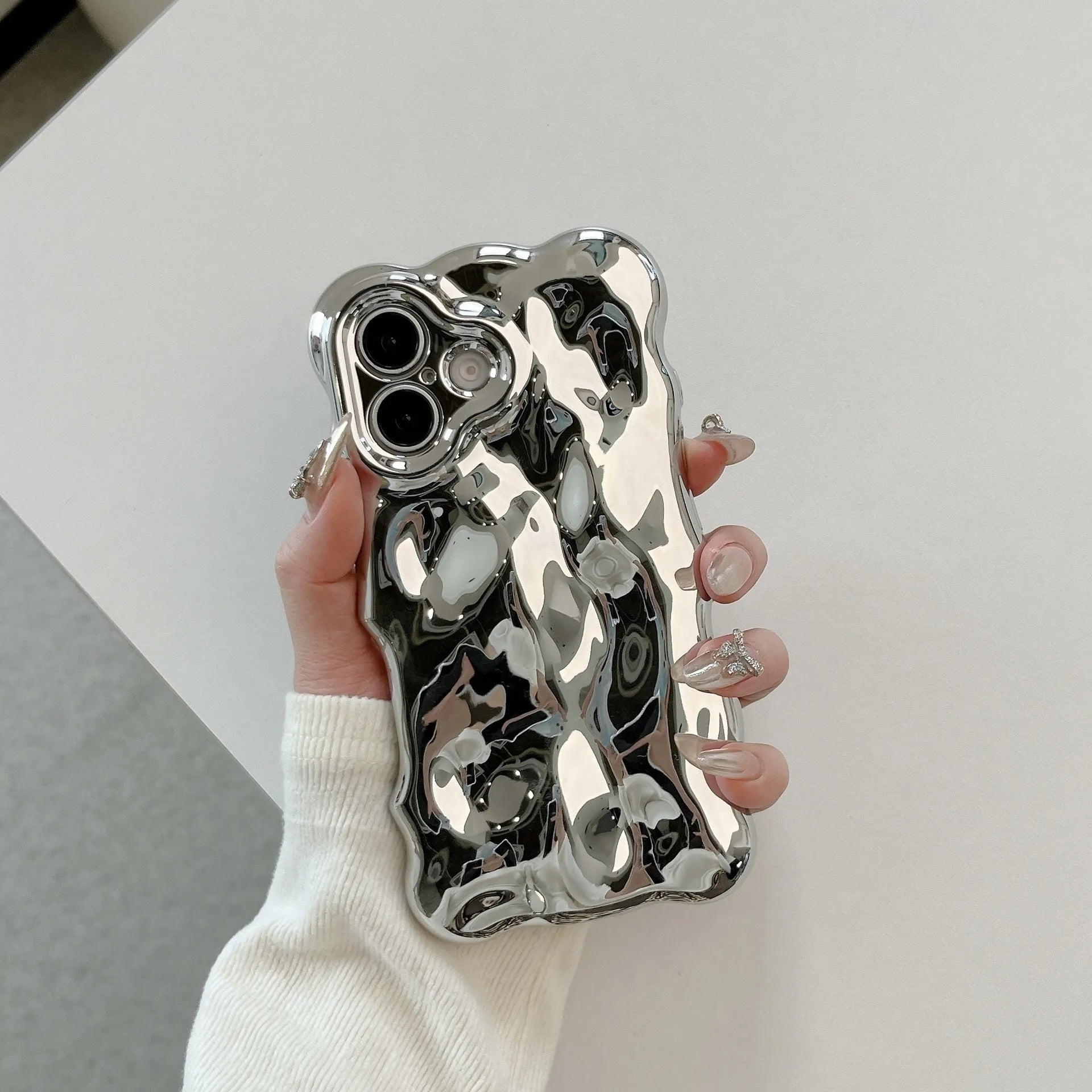 Niche Advanced Sense Plating Shell TPU phone case with wave bubble finish in silver electroplated colour