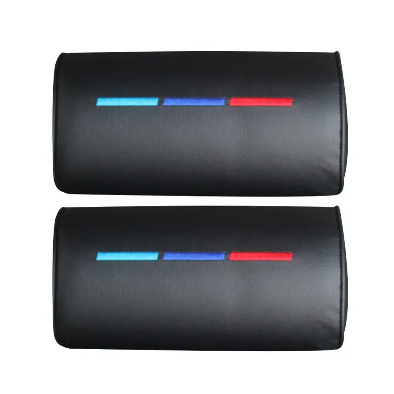 Black cotton car seat neck pillow on a car headrest for neck support