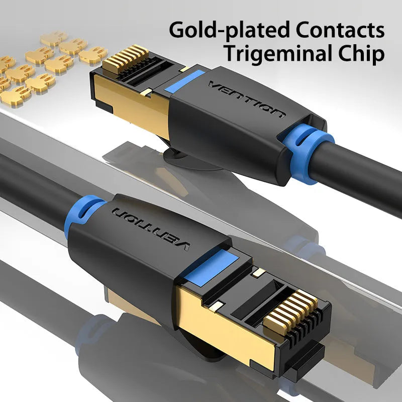 Flat and round styles of a black Cat8 shielded Ethernet cable with RJ45 plugs on a wood desk.