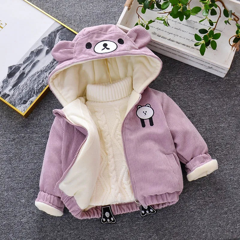 Striped corduroy baby girl coat with hood on hanger, khaki colour, side view showing ribbed texture and button closure