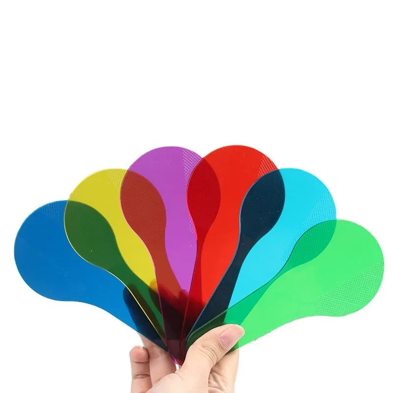 Six PVC colouring boards for children in red, yellow, blue, green, orange, and purple.
