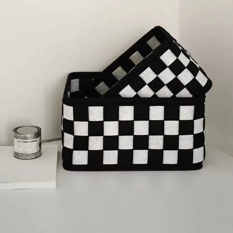 Grey checkerboard patterned felt storage basket with folded sides, showing its 37cm length.