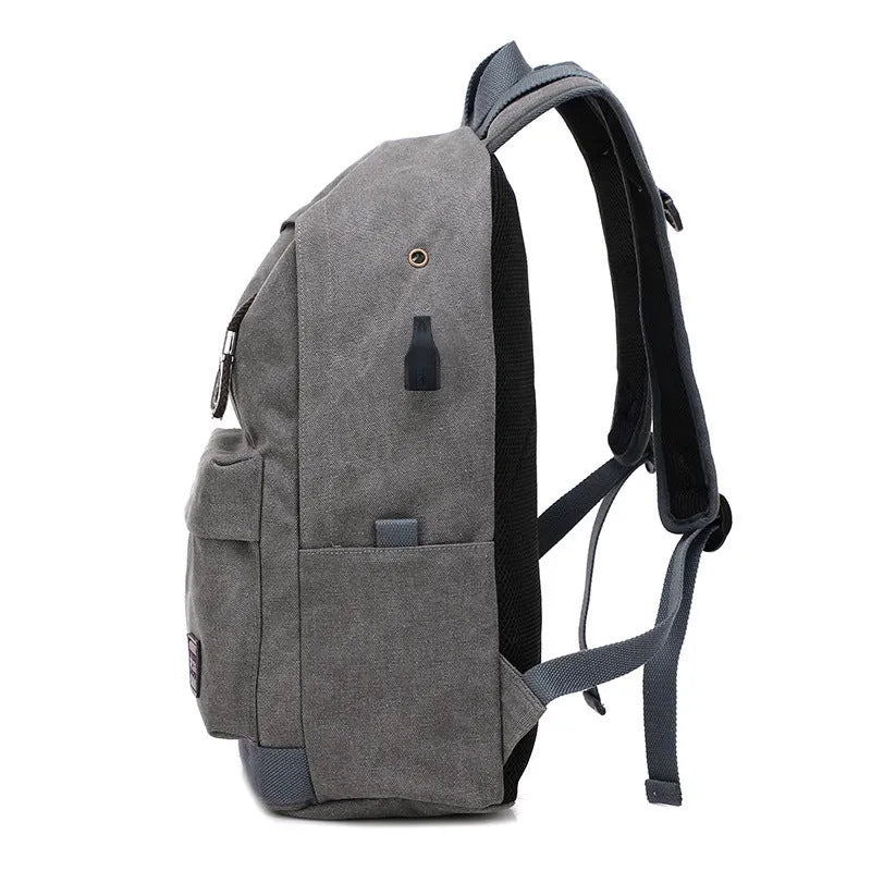 Canvas backpack with USB charging port and laptop compartment in grey colour