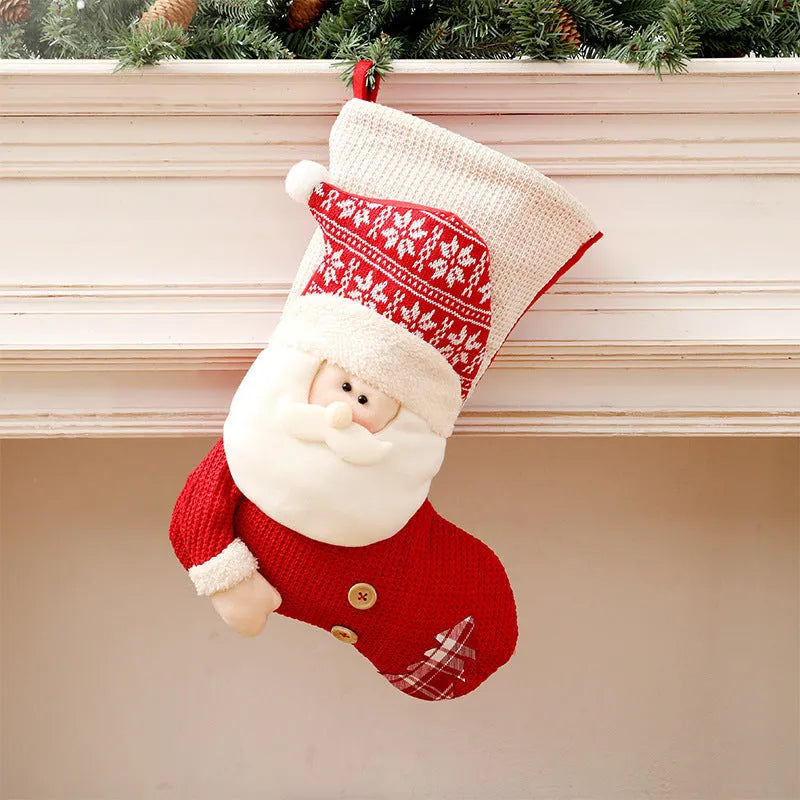 Large red and white knitted Christmas stocking with Santa Claus design for fireplace decor