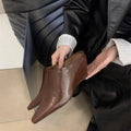 Women's Wind Wedge closed toe half slippers in PU with wedge sole, shown in black, brown, and off white colour options